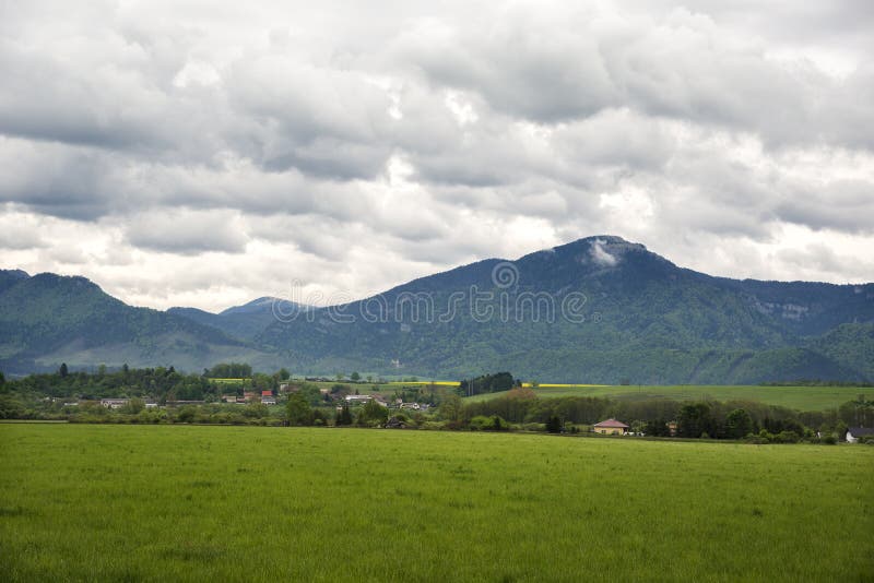Town in the Valley in the Spring. Houses and Apartment Building in the