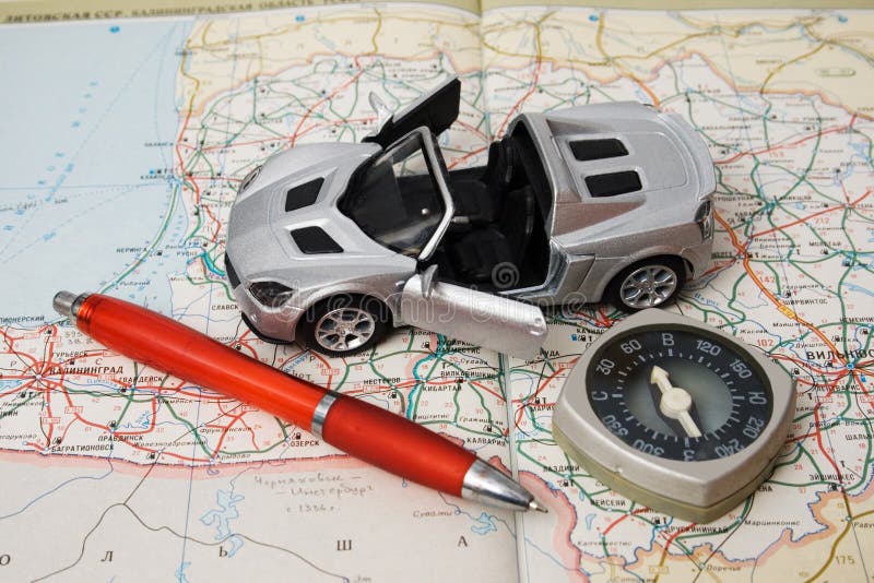 Toy car on a geographical atlas