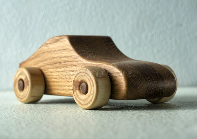 Toy car made of oak wood stock photo. Image of nostalgia 230333188