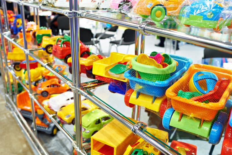 Toy colored plastic cars in children`s store