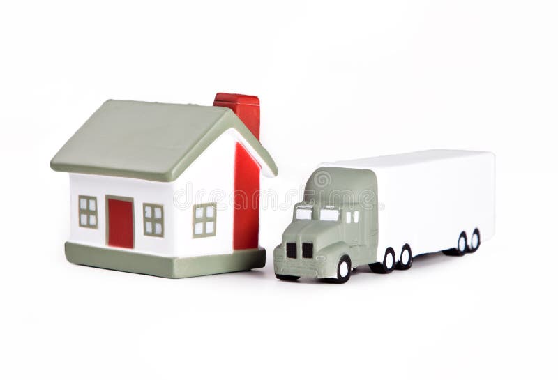 Toy house and truck on white background