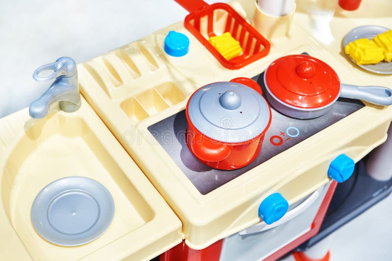 Toy kitchen in toy store stock image. Image of happy 217443789