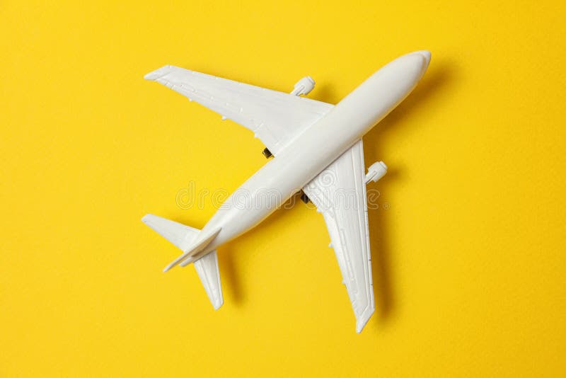 Toy Plane on Colorful Yellow Background Stock Photo - Image of abstract,  aviation: 132035950
