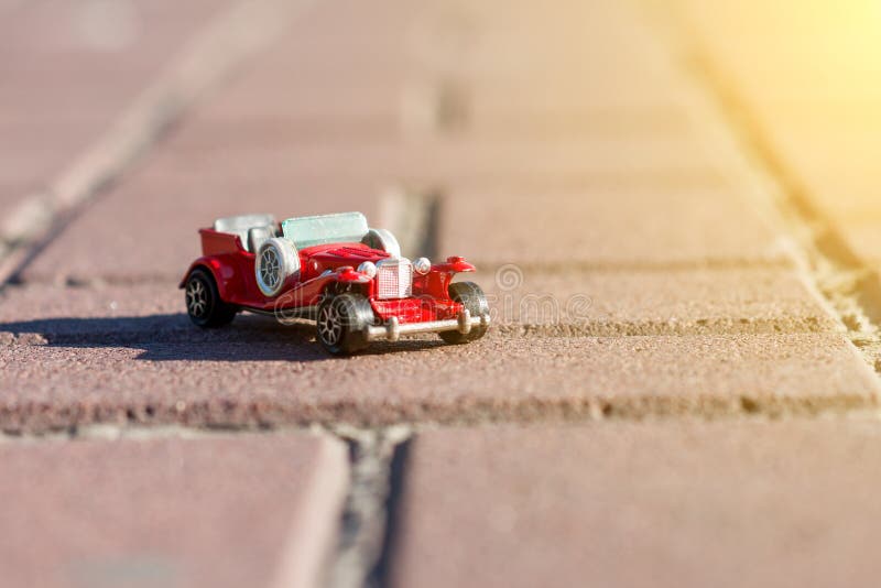 Toy retro car - symbol of travel and adventure stock image Toy retro car - symbol of travel and adventure stock image