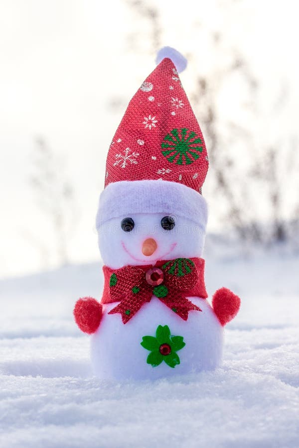 Toy Snowman Outdoors in the Snow. Cold Winter Day_ Stock Photo - Image ...