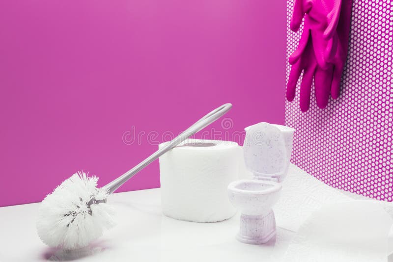 toy toilet with real size toilet brush and paper towel roll in miniature room with rubber gloves hanging stock photography toy toilet with real size toilet brush and paper towel roll in miniature room with rubber gloves hanging stock photography