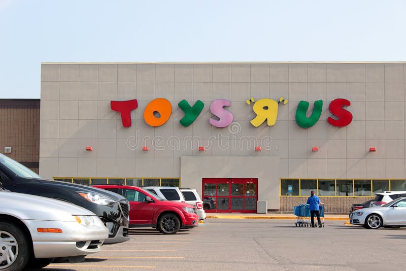Photo taken September 19, 2017 in Pointe Claire Canada on the day the toy big box store filed for bankruptcy protection in the United States and Canada. Employee is shown pushing carts back into the building. Photo taken September 19, 2017 in Pointe Claire Canada on the day the toy big box store filed for bankruptcy protection in the United States and Canada. Employee is shown pushing carts back into the building