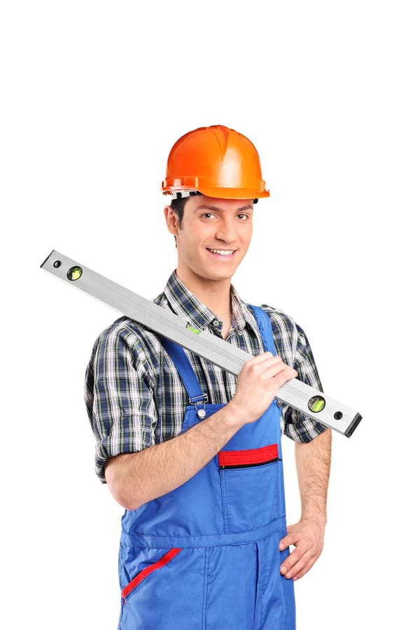 A portrait of an adult constructor worker holding construction bubble level isolated on white background. A portrait of an adult constructor worker holding construction bubble level isolated on white background