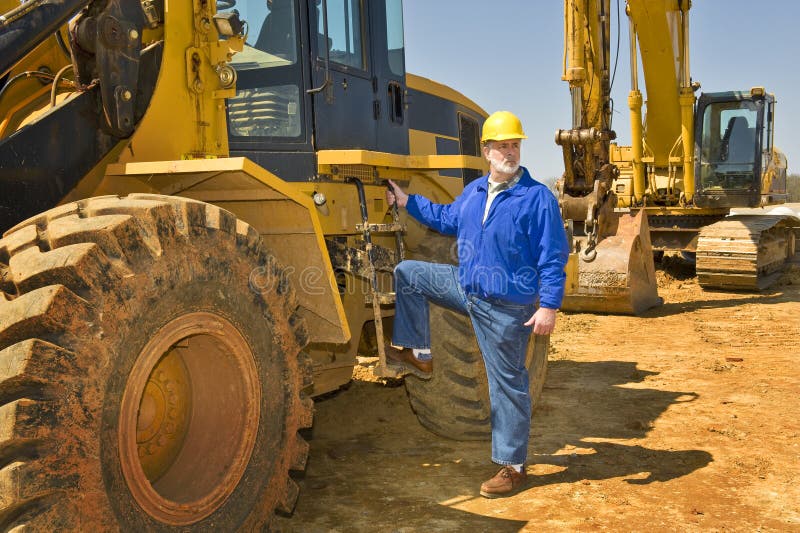 Trabajador de construcción de la carretera con el equipo imagen de archivo libre de regalías Trabajador de construcción de la carretera con el equipo imagen de archivo libre de regalías