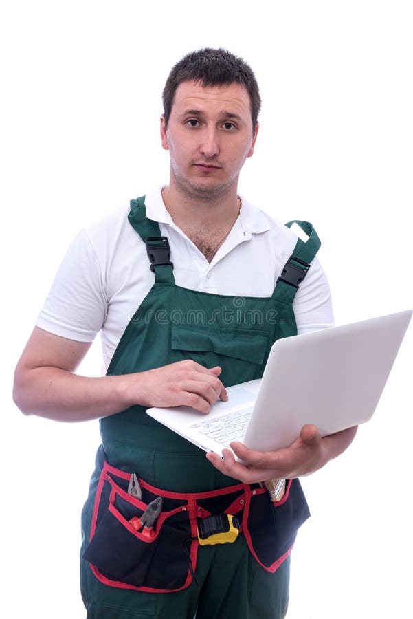 Trabalhador com laptop. jovem que se posou encapuzado com laptop branco isolado imagem de stock