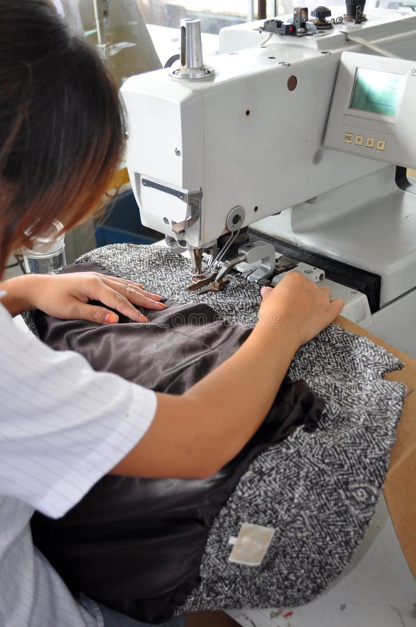 Trabalhador Sewing foto de stock Trabalhador Sewing foto de stock