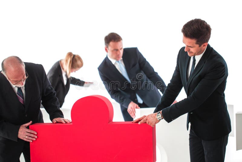 Trabalhos de equipe do negócio e solução do problema imagens de stock royalty free Trabalhos de equipe do negócio e solução do problema imagens de stock royalty free