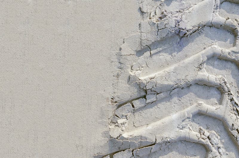 Traces of car tires in the sand. tire tracks on the beach. offroad trophy