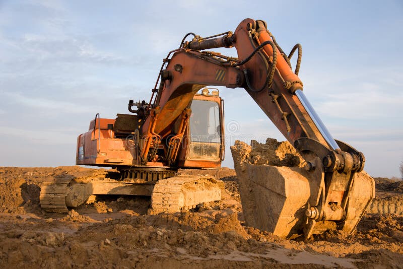 Tracktype Excavator during Earthmoving Work at Openpit Mining. Loader