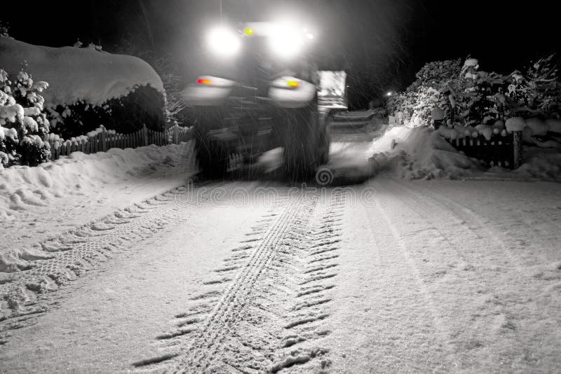 Tractor clearing snow