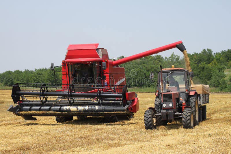 Tractor and combine stock photo. Image of feed, machine 19066124