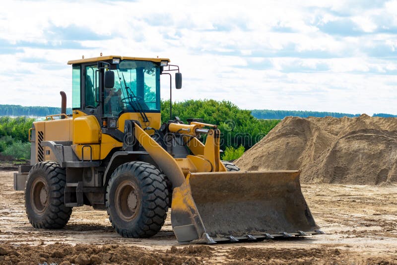 Tractor at the Construction Site. Construction Works Stock Photo