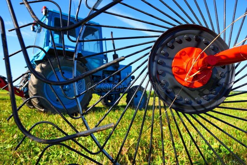 Tractor on a farmer field stock photos