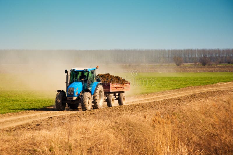 Tractor in the field stock image. Image of heavy, farm 23941767