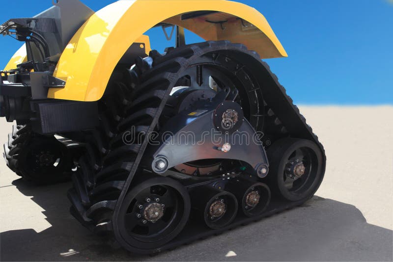 Tractor outside with rubber crampons
