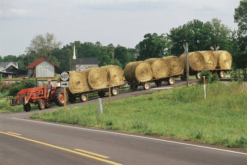 Tractor pulling flatbeds royalty free stock image