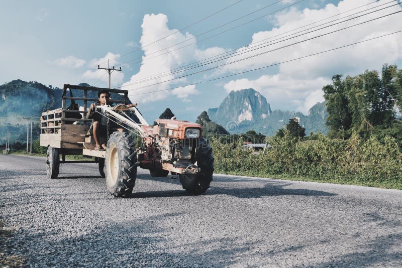 Tractor rider editorial stock photo. Image of street 56476753