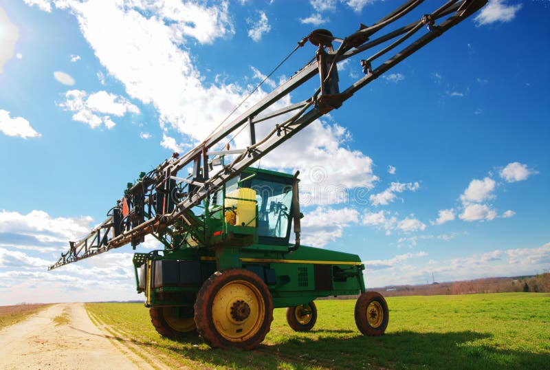 Tractor sprayer on open field 04