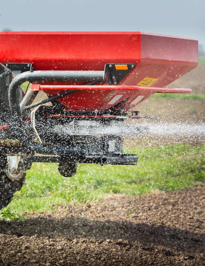 Tractor Spreading Artificial Fertilizers Stock Photo Image of farming