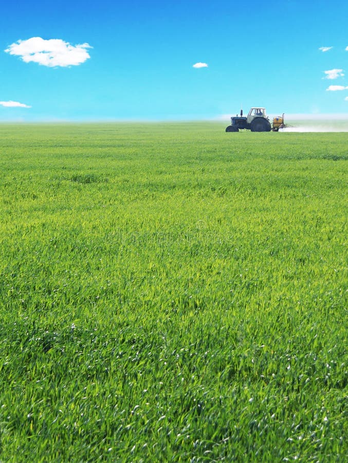 Tractor working in a field royalty free stock photography