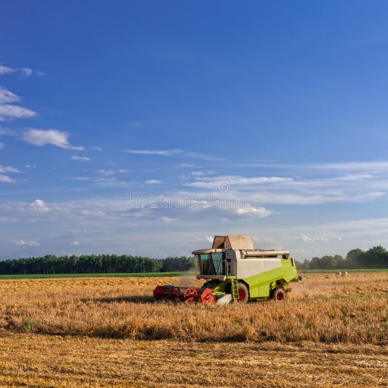 Tractors and harvesting stock image. Image of industry 43169213