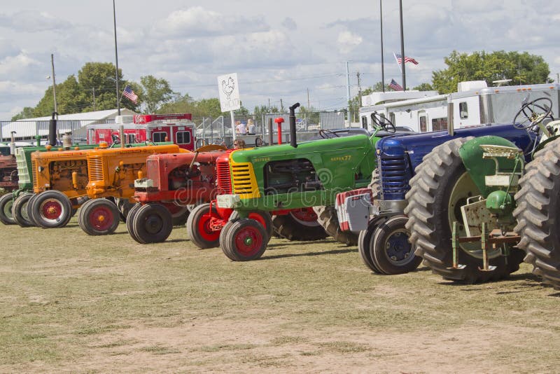 Tractors in wait stock photography