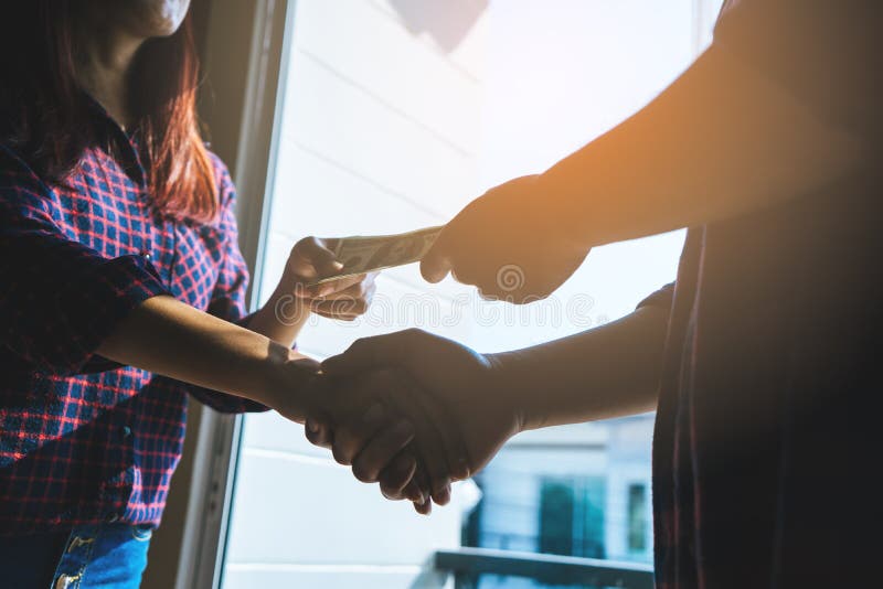 Trading money for deal for corruption agreement, no face stock image Trading money for deal for corruption agreement, no face stock image