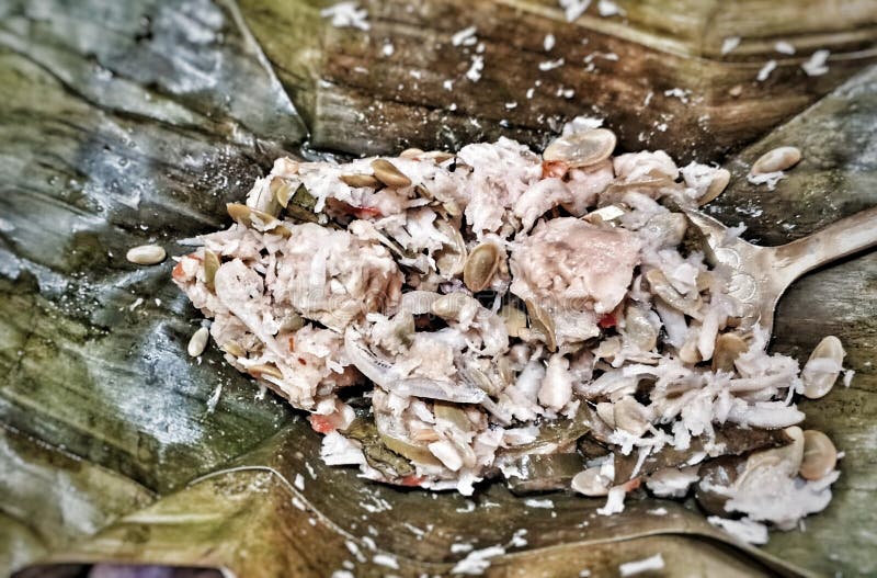 Tradisional Javanese food named pepes jamur Made from straw mushroom, with many local spice royalty free stock images
