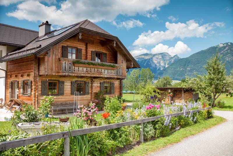 Traditional Alpine house in the mountains stock images Traditional Alpine house in the mountains stock images
