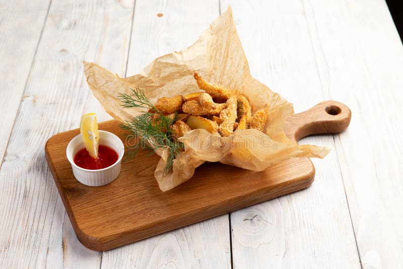 Traditional Appetizer Fish and Chips. on a Light Background Stock Image