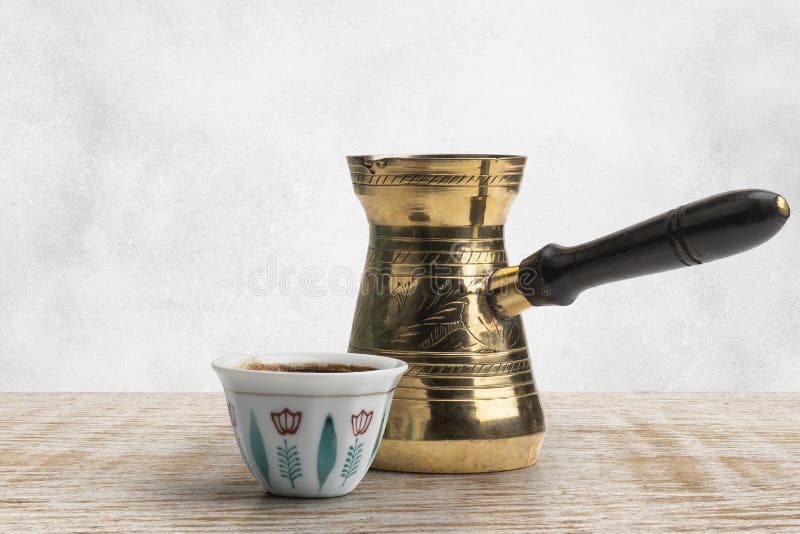 Traditional Arabic Coffee Mug and Coffee Cup, Turkish Coffee isolated on white, Clipping path