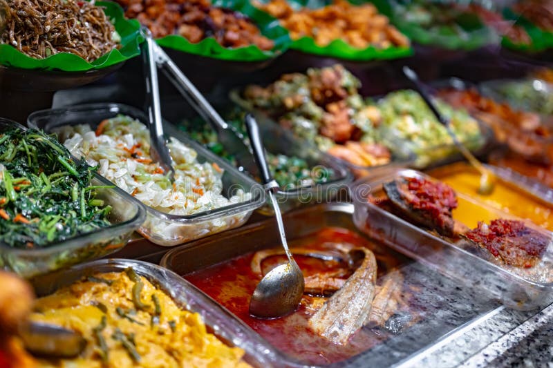 Traditional Asian Dishes Sold in a Food Court in Singapore Stock Image Traditional Asian Dishes Sold in a Food Court in Singapore Stock Image