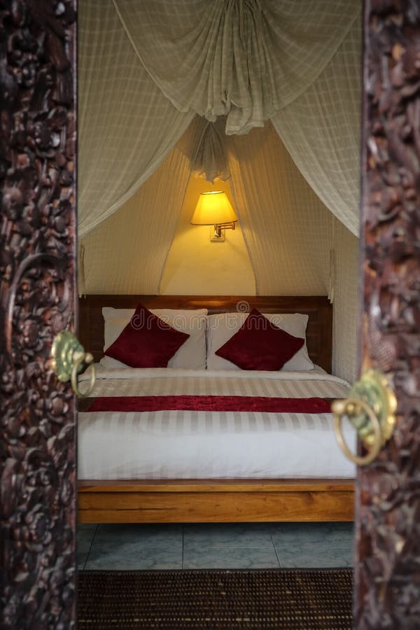 Traditional Balinese Bed with Canopy Stock Image Image of carpet
