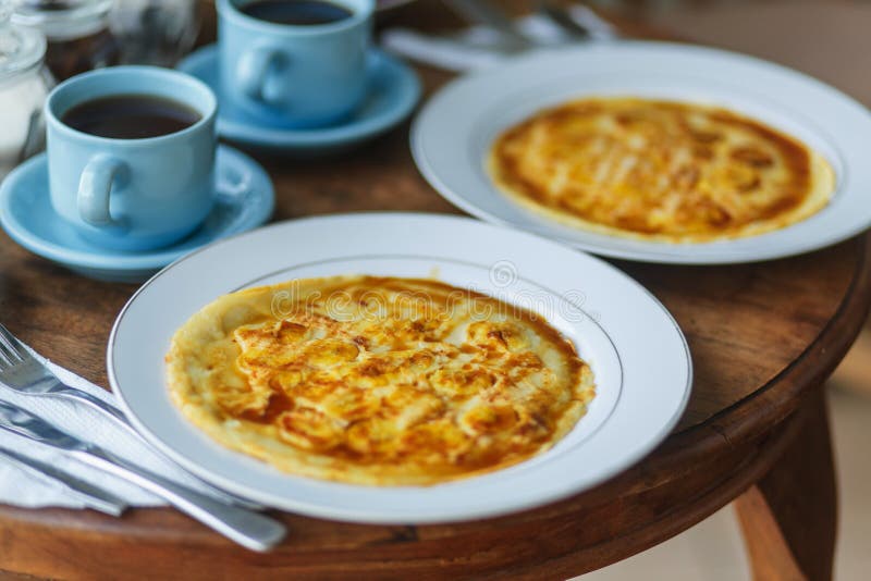 Balinese Breakfast On Wooden Table Stock Image - Image of beverage