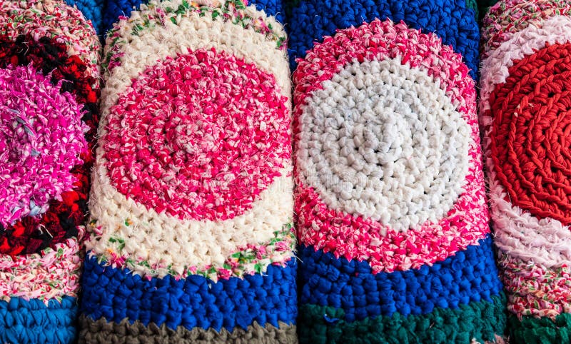Close up handicraft carpets in different colors. Motley carpets stock images, royalty-free photos and pictures