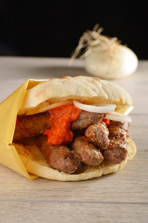 Traditional cevapcici in lepinja bread/Balkan food