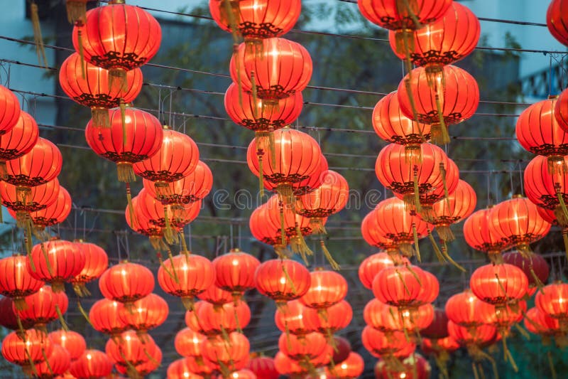 Traditional Red Lanterns in the Blue Sky and Godness Lamp at Evening at