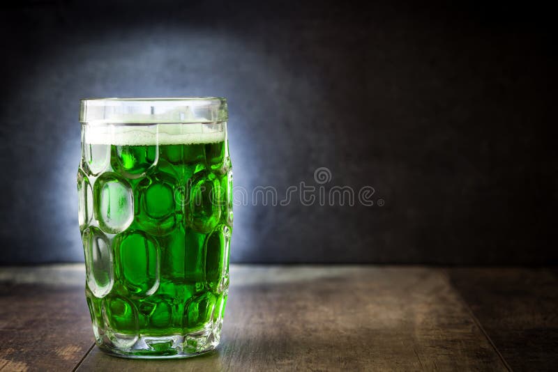 Traditional cold green beer on wooden table for Saint Patrick`s Day. Copyspace. Day copyspace stock images, royalty-free photos and pictures