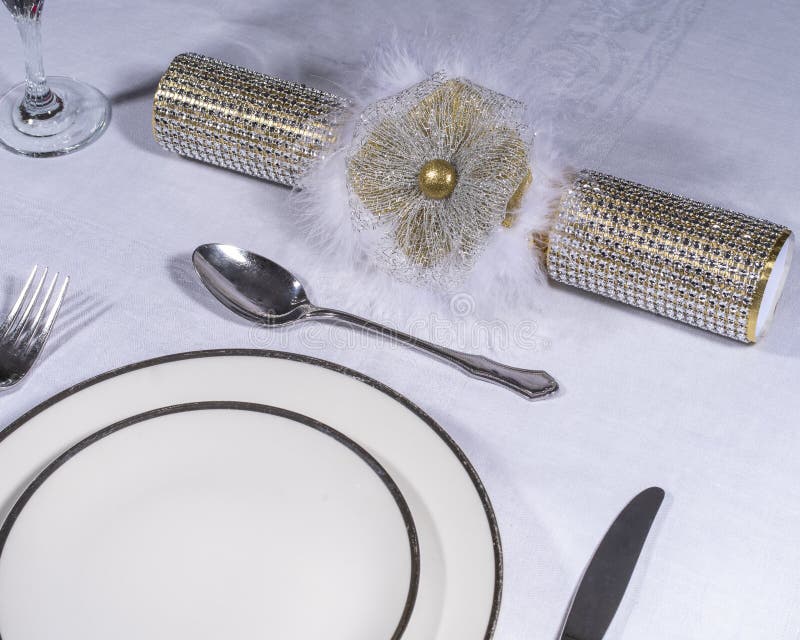 Traditional Cracker and Table Setting. A traditional cracker displayed with a table setting