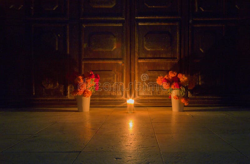 Traditional day of the dead, altar with dead bread, flowers, food and candles. Party celebrated throughout Mexico on October 31