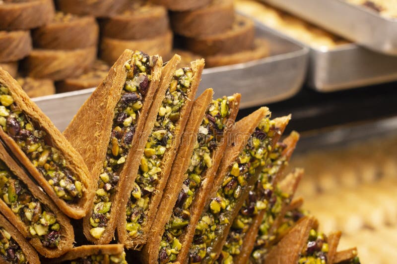 Traditional delicious turkish dessert baklava in the shop window showcase. Different kinds of turkish delights. Popular stock images Traditional delicious turkish dessert baklava in the shop window showcase. Different kinds of turkish delights. Popular stock images
