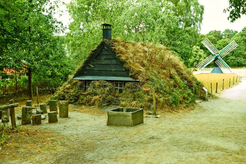 Traditional Dutch house with a mill. Netherlands July stock photography Traditional Dutch house with a mill. Netherlands July stock photography