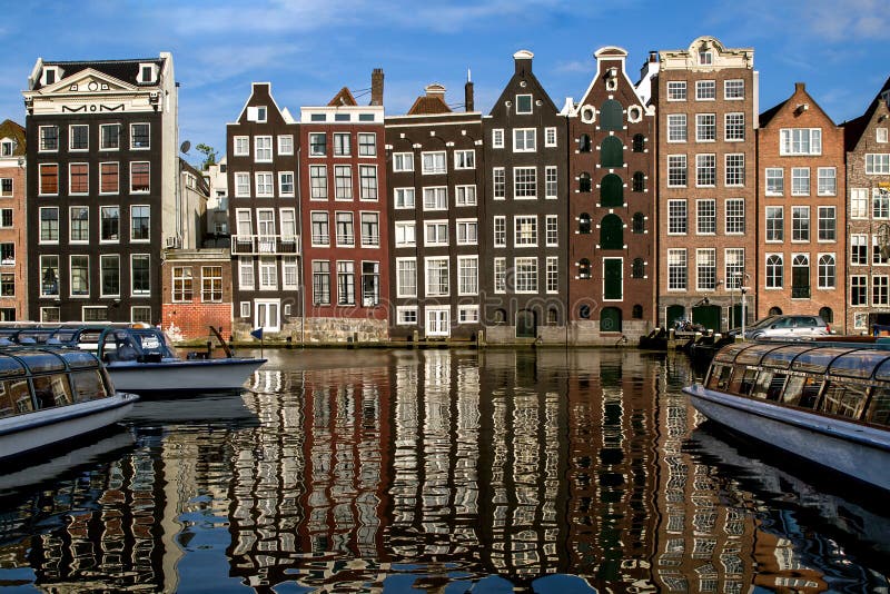 Traditional Dutch Medieval Buildings in Along the Canal Side, Reflected ...