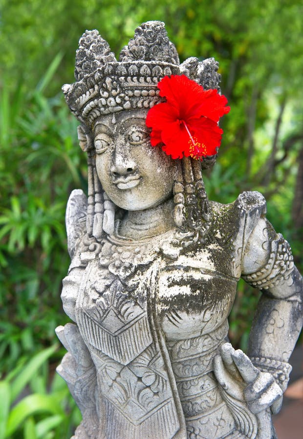 Traditional female balinese statue stock photo