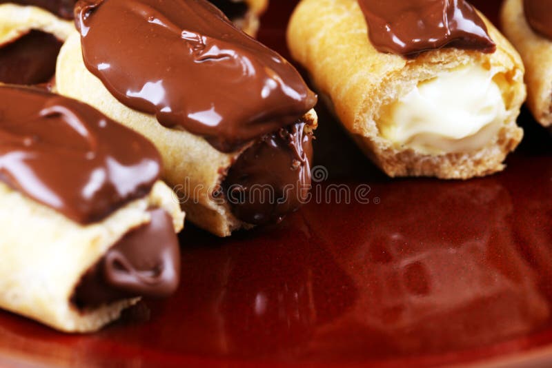 Traditional French Dessert. Eclair with Chocolate Icing. Pastery